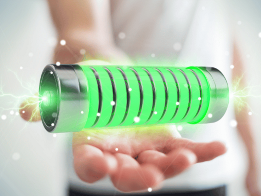 [Translate to English:] Darstellung einer Batterie in einer Hand.